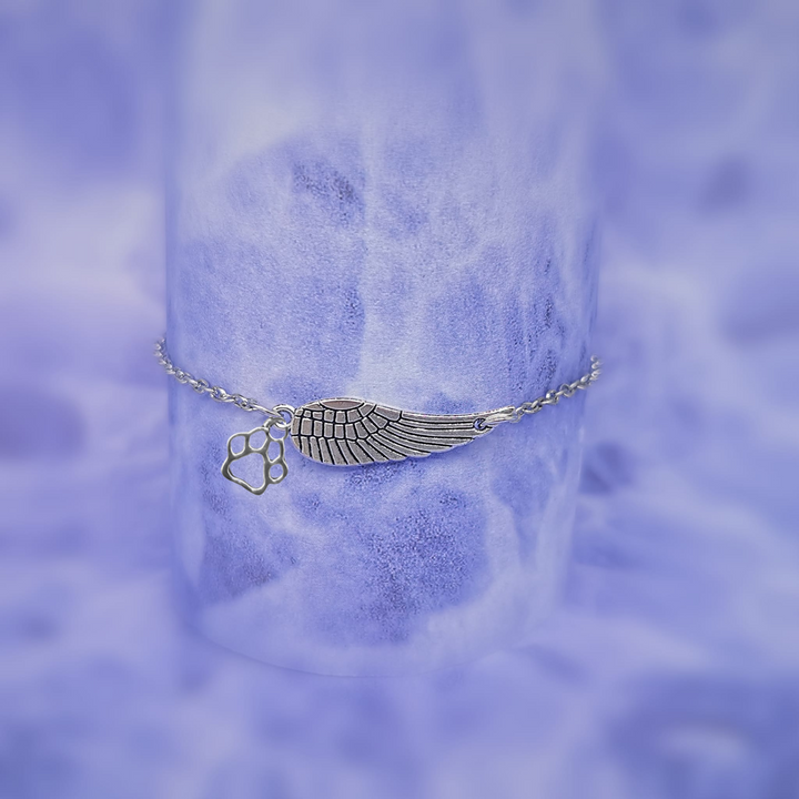 Braccialetto commemorativo in argento con ali d'angelo e impronta di zampa | Fatti a mano