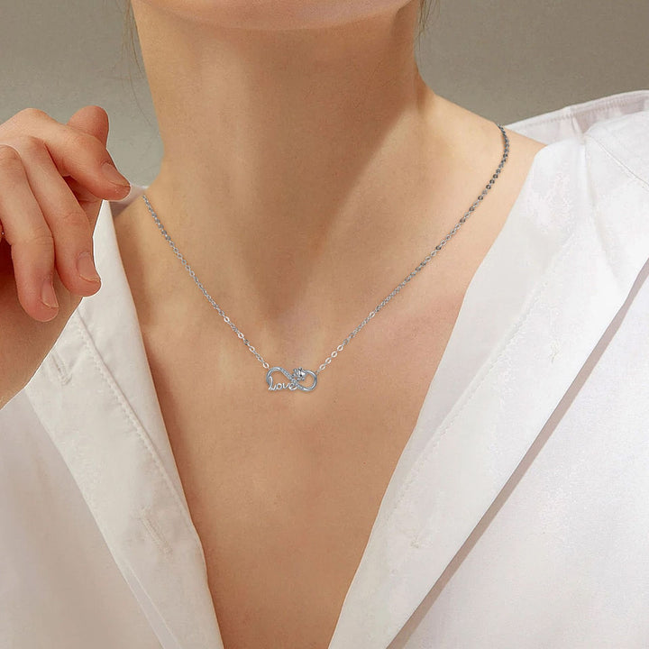 Collegati per sempre - Collana Infinity a forma di zampa in argento